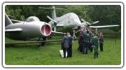 Scouts looking at outside aircraft